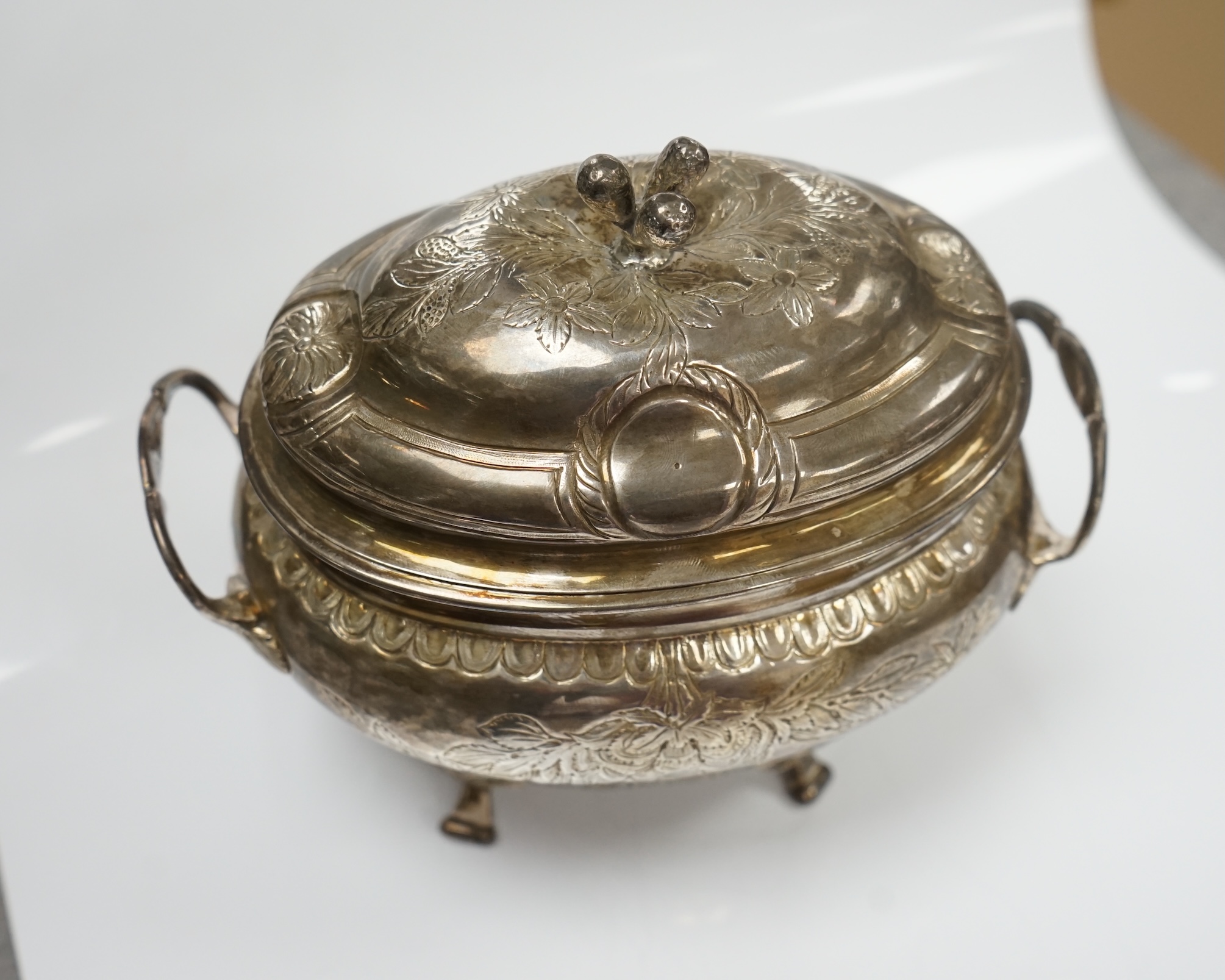 An early 19th century French? white metal oval two handled bowl and cover, maker's mark stamped twice, length 15.3cm, 14.5oz. Condition - poor